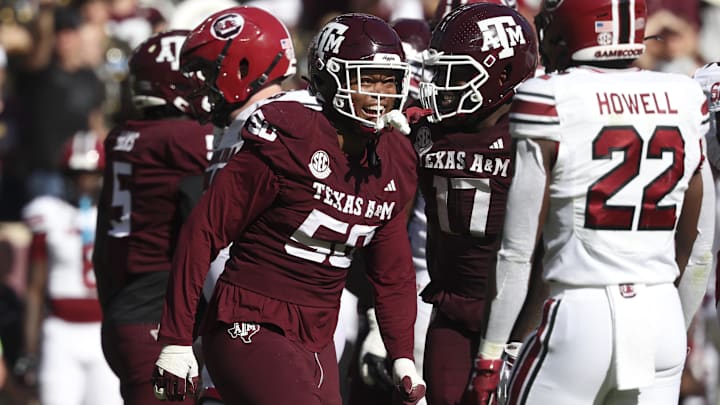 Nov 15, 2025; College Station, Texas, USA; Texas A&M Aggies defensive end Dayon Hayes (50) reacts after making a tackle during the fourth quarter against the South Carolina Gamecocks at Kyle Field. Mandatory Credit: Troy Taormina-Imagn Images