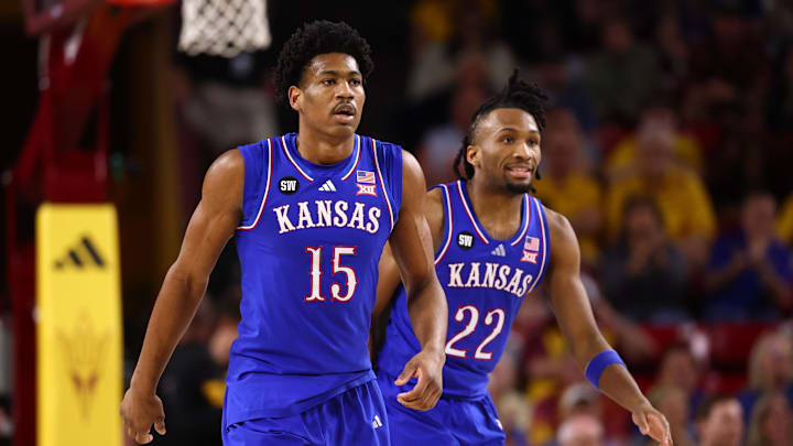 Mar 3, 2026; Tempe, Arizona, USA; Kansas Jayhawks forward Bryson Tiller (15) and guard Darryn Peterson (22) against the Arizona State Sun Devils at Desert Financial Arena. Mandatory Credit: Mark J. Rebilas-Imagn Images