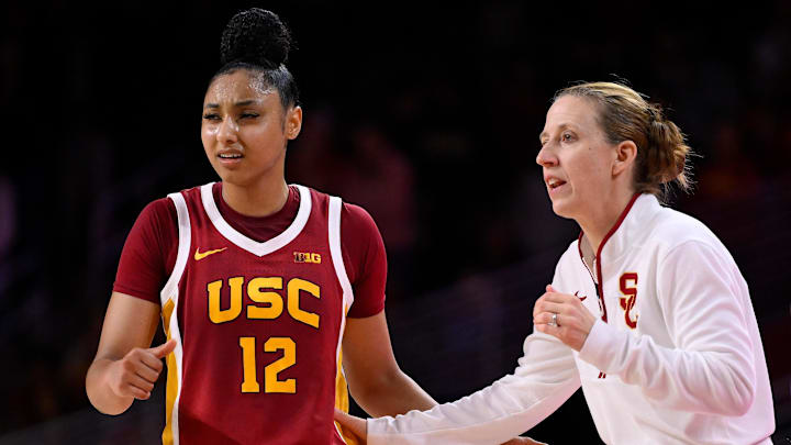 Feb 13, 2025; Los Angeles, California, USA; USC Trojans guard JuJu Watkins (12) talks to USC Trojans head coach Lindsay Gottliebduring an NCAA basketball game at Galen Center. Mandatory Credit: Robert Hanashiro-Imagn Images