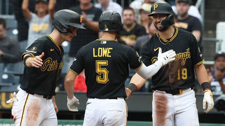 Jun 27, 2026; Pittsburgh, Pennsylvania, USA; Pittsburgh Pirates Pittsburgh Pirates center fielder Jake Mangum (left) and shortstop Jared Triolo (19) congratulate second baseman Brandon Lowe (5) crossing home plate on a three-run home run against the Cincinnati Reds during the third inning at PNC Park. Mandatory Credit: Charles LeClaire-Imagn Images Jun 27, 2026; Pittsburgh, Pennsylvania, USA; Pittsburgh Pirates Pittsburgh Pirates center fielder Jake Mangum (left) and shortstop Jared Triolo (19) congratulate second baseman Brandon Lowe (5) crossing home plate on a three-run home run against the Cincinnati Reds during the third inning at PNC Park. Mandatory Credit: Charles LeClaire-Imagn Images