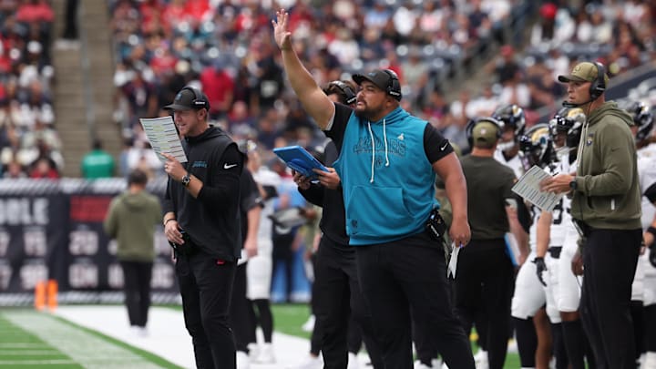 Nov 9, 2025; Houston, Texas, USA; Jacksonville Jaguars head coach Liam Coen calls a play from the sidelines against the Houston Texans during the first half at NRG Stadium. Mandatory Credit: Thomas Shea-Imagn Images