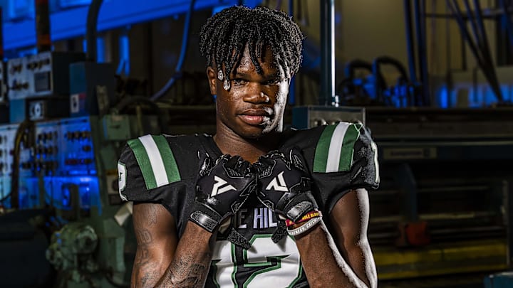 August 1, 2021; Suwanee, Georgia, USA; Travis Hunter poses for a photo at Collins Hill High School. Mandatory Credit: Dale Zanine-Imagn Images August 1, 2021; Suwanee, Georgia, USA; Travis Hunter poses for a photo at Collins Hill High School. Mandatory Credit: Dale Zanine-Imagn Images