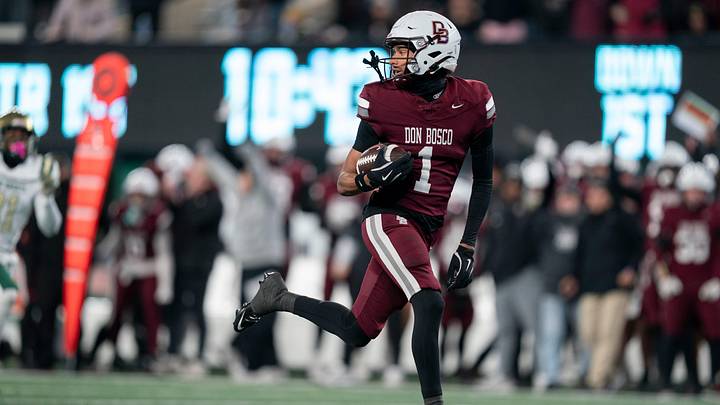Don Bosco's Isaiah Alvarez (1) looks back after catching a pass for a touchdown during the Non-Public A state title game between Don Bosco and St. Joseph at MetLife Stadium on Friday, Nov. 28, 2025. Don Bosco's Isaiah Alvarez (1) looks back after catching a pass for a touchdown during the Non-Public A state title game between Don Bosco and St. Joseph at MetLife Stadium on Friday, Nov. 28, 2025.