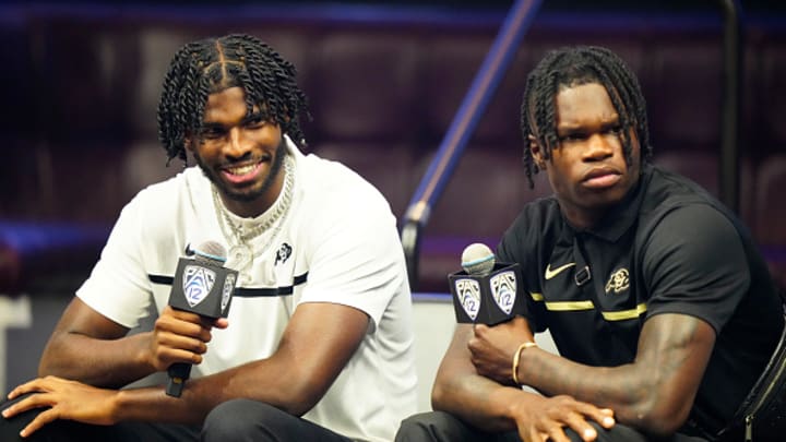 Shedeur Sanders #2 and Travis Hunter #12 of the University of Colorado Buffaloes speak with the media at Zouk Nightclub at Resorts World Las Vegas on July 21, 2023 in Las Vegas, Nevada. 
