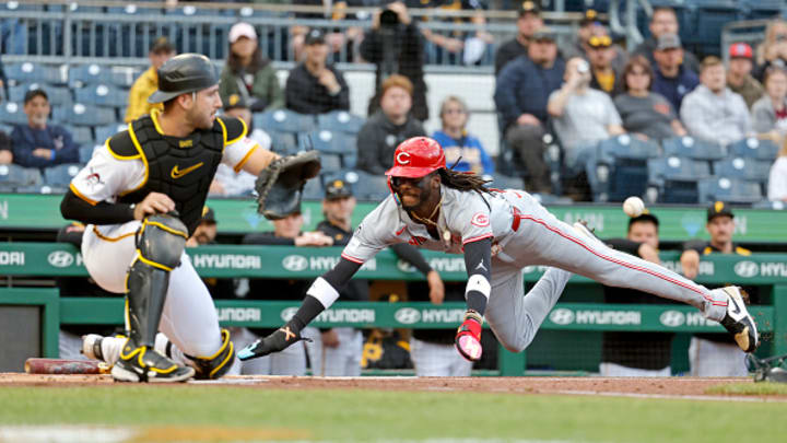 Elly De La Cruz flies safely into home against the Pittsburgh Pirates. 