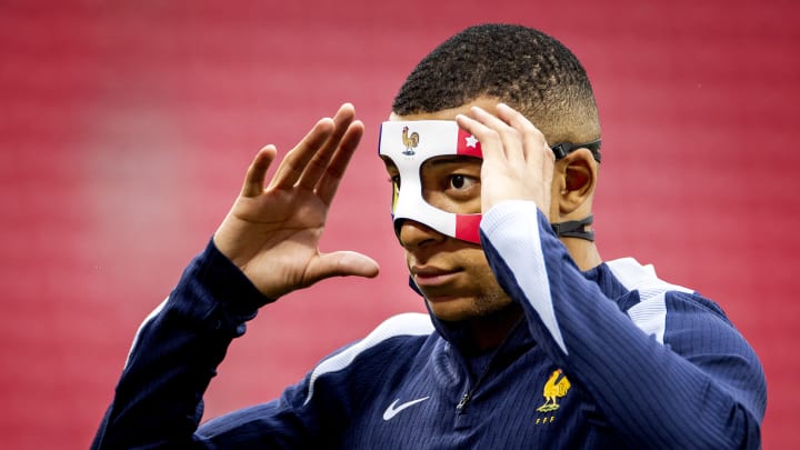 Mbappe has been wearing a protective mask after breaking his nose Mbappe has been wearing a protective mask after breaking his nose