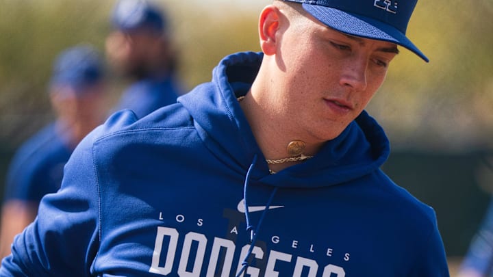 Feb 18, 2023; Glendale, AZ, USA; Los Angeles Dodgers pitcher Bobby Miller (95) practices drills