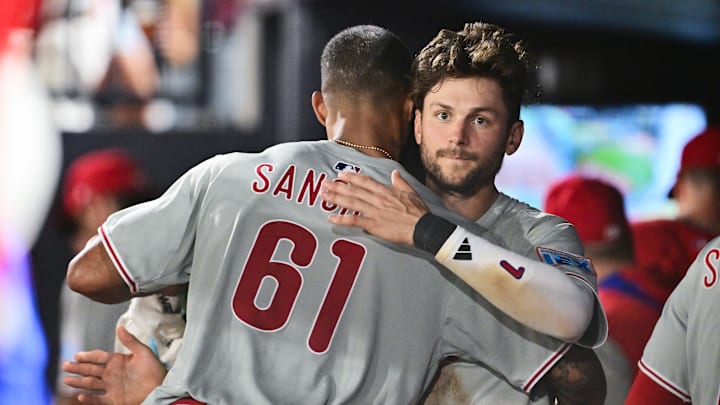 Philadelphia Phillies' Trea Turner and Cristopher Sánchez