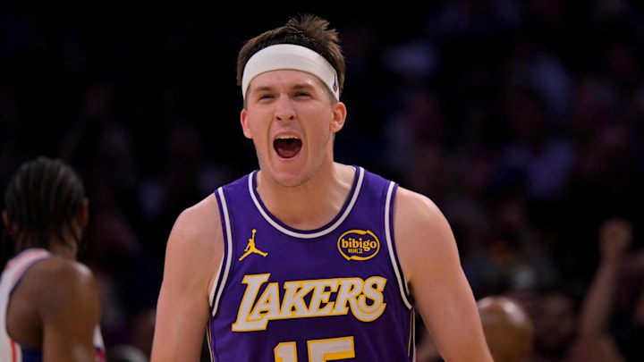 Feb 5, 2026; Los Angeles, California, USA;  Los Angeles Lakers guard Austin Reaves (15) reacts at the buzzer defeating the Philadelphia 76ers at Crypto.com Arena. Mandatory Credit: Jayne Kamin-Oncea-Imagn Images