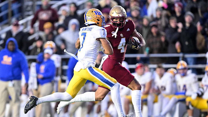 Nov 30, 2024; Chestnut Hill, Massachusetts, USA; Boston College Eagles wide receiver Reed Harris (4) runs against Pittsburgh Panthers defensive back Javon McIntyre (7) during the first half at Alumni Stadium. Mandatory Credit: Brian Fluharty-Imagn Images