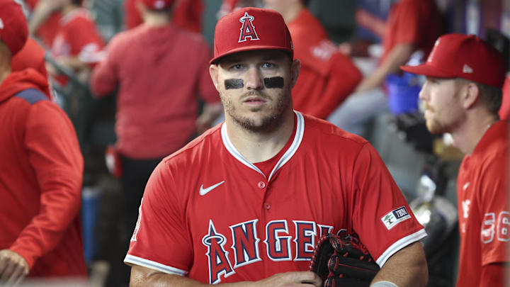 Apr 12, 2025; Houston, Texas, USA; Los Angeles Angels right fielder Mike Trout (27) walks in the dugout before the game against the Houston Astros at Daikin Park. Mandatory Credit: Troy Taormina-Imagn Images Apr 12, 2025; Houston, Texas, USA; Los Angeles Angels right fielder Mike Trout (27) walks in the dugout before the game against the Houston Astros at Daikin Park. Mandatory Credit: Troy Taormina-Imagn Images