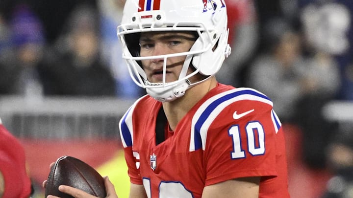 Dec 1, 2025; Foxborough, Massachusetts, USA; New England Patriots quarterback Drake Maye (10) catches the snap during the first quarter against the New York Giants at Gillette Stadium. Dec 1, 2025; Foxborough, Massachusetts, USA; New England Patriots quarterback Drake Maye (10) catches the snap during the first quarter against the New York Giants at Gillette Stadium.