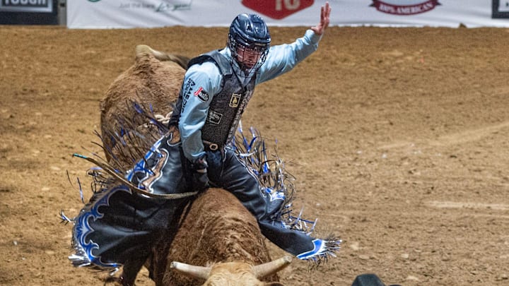 Contestant Hayes Weight of Goshen, Utah, competes in bull riding during the Dixie National Rodeo in Jackson, Miss., Wednesday, Feb. 12, 2025. Contestant Hayes Weight of Goshen, Utah, competes in bull riding during the Dixie National Rodeo in Jackson, Miss., Wednesday, Feb. 12, 2025.
