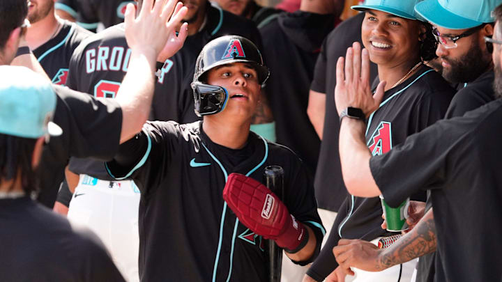 Arizona Diamondbacks' Jorge Barrosa celebrates after scoring on an RBI-single by Corbin Carroll against the Kansas City Royals in the third inning during a spring training game at Salt River Fields at Talking Stick on Feb. 28, 2025, in Scottsdale. Arizona Diamondbacks' Jorge Barrosa celebrates after scoring on an RBI-single by Corbin Carroll against the Kansas City Royals in the third inning during a spring training game at Salt River Fields at Talking Stick on Feb. 28, 2025, in Scottsdale.