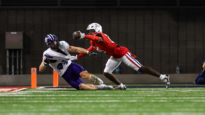 Sep 6, 2025; Tucson, Arizona, USA; Arizona Wildcats defensive back Michael Dansby (25) blocks a pass intended for Weber State Wildcats tight end Noah Bennet (84) during the third quarter of the game at Arizona Stadium. Mandatory Credit: Aryanna Frank-Imagn Images Sep 6, 2025; Tucson, Arizona, USA; Arizona Wildcats defensive back Michael Dansby (25) blocks a pass intended for Weber State Wildcats tight end Noah Bennet (84) during the third quarter of the game at Arizona Stadium. Mandatory Credit: Aryanna Frank-Imagn Images
