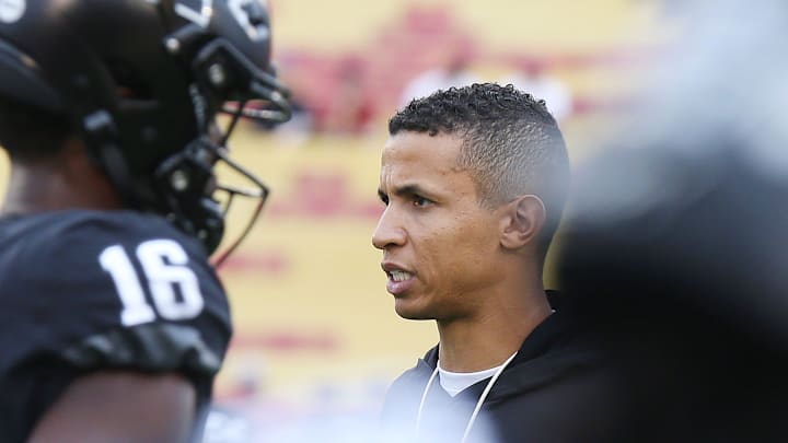 Iowa State Cyclones offensive coordinator Nate Scheelhaase watches the team work out before an NCAA college football game against Oklahoma State Cowboys at Jack Trice Stadium on Saturday, Sept. 23, 2023, in Ames, Iowa. Iowa State Cyclones offensive coordinator Nate Scheelhaase watches the team work out before an NCAA college football game against Oklahoma State Cowboys at Jack Trice Stadium on Saturday, Sept. 23, 2023, in Ames, Iowa.