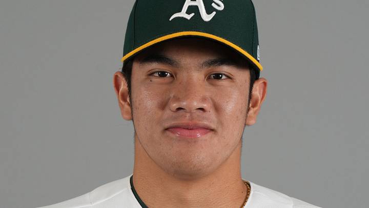 Feb 20, 2026; Mesa, AZ, USA; Athletics pitcher Wei-En Lin (81) poses for Photo Day at HoHoKam Stadium. Mandatory Credit: Rick Scuteri-Imagn Images