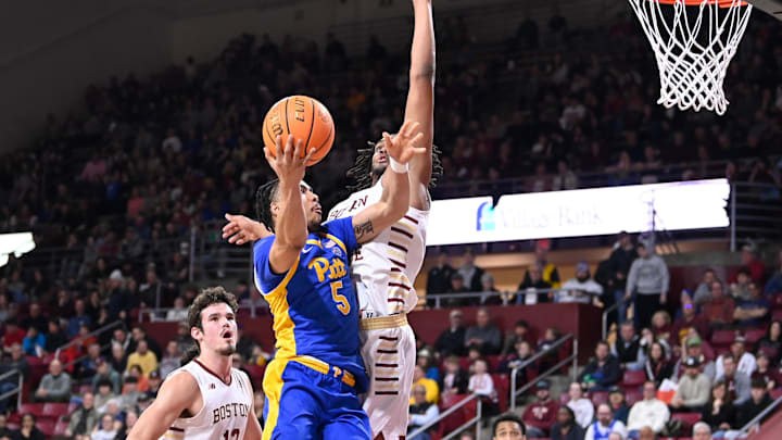 Mar 2, 2024; Chestnut Hill, Massachusetts, USA; Pittsburgh Panthers guard Ishmael Leggett (5) shoots a lay up against the Boston College Eagles during the first half at Conte Forum. Mandatory Credit: Eric Canha-Imagn Images
