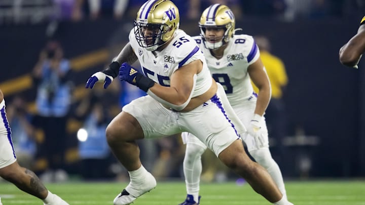 Troy Fautanu tries to clear the way for Washington. His  skills as a tackle could lead to playing guard in the NFL.