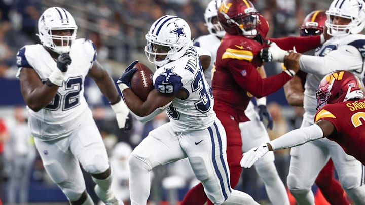 Dallas Cowboys running back Javonte Williams runs for a touchdown against the Washington Commanders at AT&T Stadium