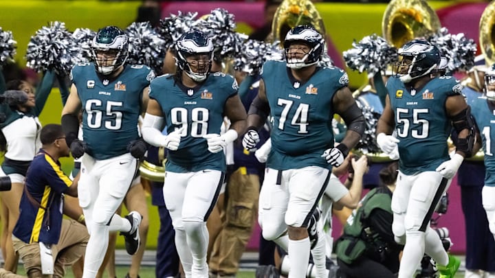 Feb 9, 2025; New Orleans, LA, USA; Philadelphia Eagles offensive tackle Lane Johnson (65), defensive end Jalen Carter (98), offensive tackle Fred Johnson (74) and defensive end Brandon Graham (55) enter the field prior to game against the Kansas City Chiefs during Super Bowl LIX at Ceasars Superdome. Mandatory Credit: Mark J. Rebilas-Imagn Images Feb 9, 2025; New Orleans, LA, USA; Philadelphia Eagles offensive tackle Lane Johnson (65), defensive end Jalen Carter (98), offensive tackle Fred Johnson (74) and defensive end Brandon Graham (55) enter the field prior to game against the Kansas City Chiefs during Super Bowl LIX at Ceasars Superdome. Mandatory Credit: Mark J. Rebilas-Imagn Images
