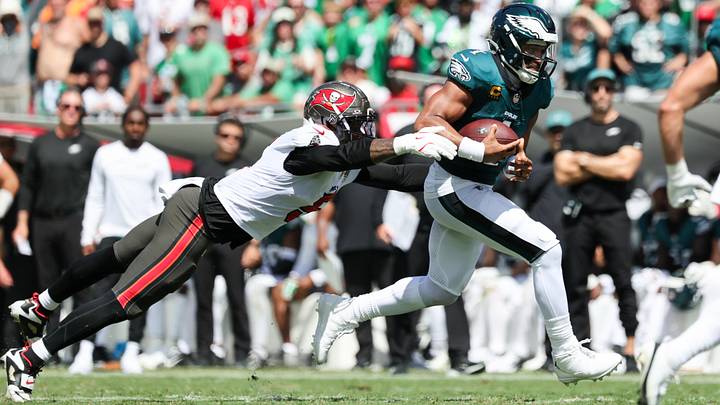 Eagles quarterback Jalen Hurts and Buccaneers edge rusher Haason Reddick. Eagles quarterback Jalen Hurts and Buccaneers edge rusher Haason Reddick.