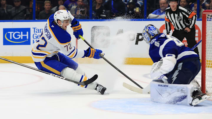 Feb 3, 2026; Tampa, Florida, USA; Buffalo Sabres center Tage Thompson (72) shoots as Tampa Bay Lightning goaltender Andrei Vasilevskiy (88) makes a save during the overtime period at Benchmark International Arena. Mandatory Credit: Kim Klement Neitzel-Imagn Images