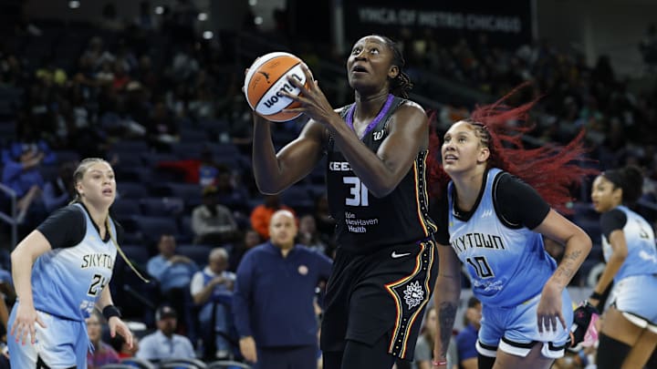 Sep 3, 2025; Chicago, Illinois, USA; Connecticut Sun center Tina Charles (31) drives to the basket against Chicago Sky center Kamilla Cardoso (10) during the first half at Wintrust Arena. Mandatory Credit: Kamil Krzaczynski-Imagn Images