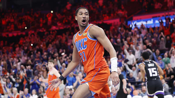 Feb 1, 2025; Oklahoma City, Oklahoma, USA; Oklahoma City Thunder guard Aaron Wiggins (21) reacts after scoring against the Sacramento Kings during the second half at Paycom Center. Mandatory Credit: Alonzo Adams-Imagn Images