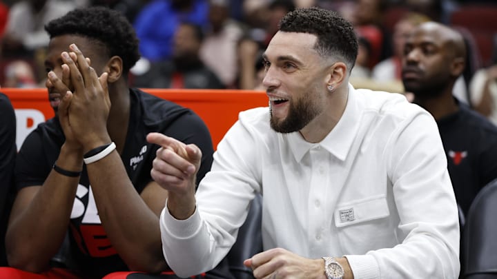Dec 6, 2023; Chicago, Illinois, USA; Injured Chicago Bulls guard Zach LaVine (8) reacts during the first half of a basketball game against the Charlotte Hornets at United Center. Mandatory Credit: Kamil Krzaczynski-Imagn Images