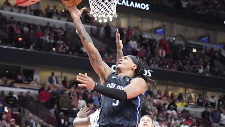 Orlando Magic forward Paolo Banchero (5) scores against the Chicago Bulls during the second half at United Center. 