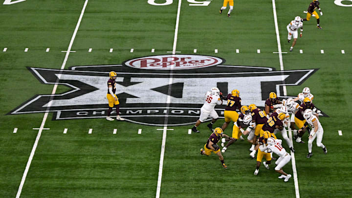 Dec 7, 2024; Arlington, TX, USA; A view of the Big 12 logo and stadium during the game between the Iowa State Cyclones and the Arizona State Sun Devils at AT&T Stadium. Mandatory Credit: Jerome Miron-Imagn Images Dec 7, 2024; Arlington, TX, USA; A view of the Big 12 logo and stadium during the game between the Iowa State Cyclones and the Arizona State Sun Devils at AT&T Stadium. Mandatory Credit: Jerome Miron-Imagn Images