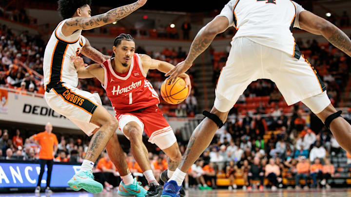 Mar 7, 2026; Stillwater, Oklahoma, USA; Houston Cougars guard Isiah Harwell (1) drives to the basket during the second half against the Oklahoma State Cowboys at Gallagher-Iba Arena. Mandatory Credit: William Purnell-Imagn Images