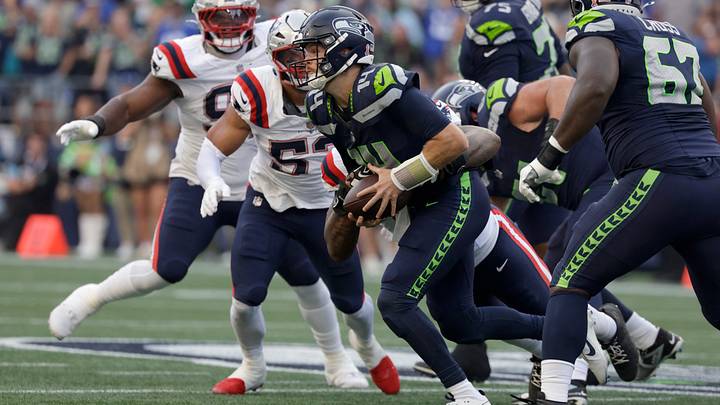 Sep 9, 2026; Seattle, Washington, USA; New England Patriots defensive end Dre'Mont Jones (5) sacks Seattle Seahawks quarterback Sam Darnold (14) during the first quarter at Lumen Field. Mandatory Credit: Joe Nicholson-Imagn Images Sep 9, 2026; Seattle, Washington, USA; New England Patriots defensive end Dre'Mont Jones (5) sacks Seattle Seahawks quarterback Sam Darnold (14) during the first quarter at Lumen Field. Mandatory Credit: Joe Nicholson-Imagn Images