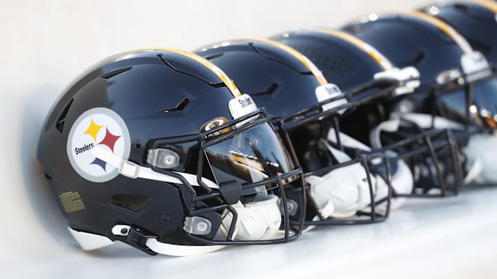 Oct 6, 2024; Pittsburgh, Pennsylvania, USA; Pittsburgh Steelers helmets on the bench before a game against the Dallas Cowboys at Acrisure Stadium. Mandatory Credit: Charles LeClaire-Imagn Images
