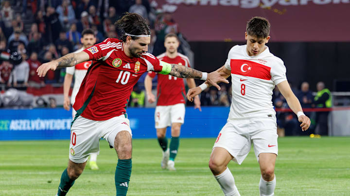 Dominik Szoboszlai (left) and Arda Guler have continued their on-pitch dispute online