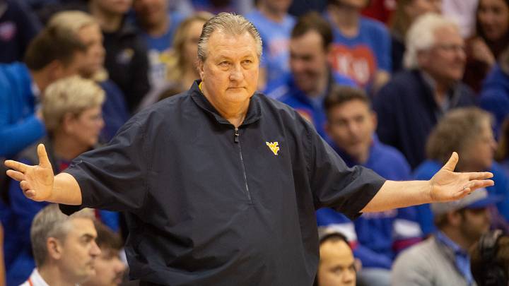 West Virginia coach Bob Huggins reacts to a call during the first half of Saturday s game against Kansas inside Allen Fieldhouse. West Virginia coach Bob Huggins reacts to a call during the first half of Saturday s game against Kansas inside Allen Fieldhouse.