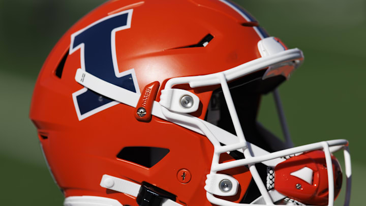 Oct 1, 2022; Madison, Wisconsin, USA; Illinois Fighting Illini helmet during warmups prior to the game against the Wisconsin Badgers at Camp Randall Stadium. Mandatory Credit: Jeff Hanisch-Imagn Images Oct 1, 2022; Madison, Wisconsin, USA; Illinois Fighting Illini helmet during warmups prior to the game against the Wisconsin Badgers at Camp Randall Stadium. Mandatory Credit: Jeff Hanisch-Imagn Images