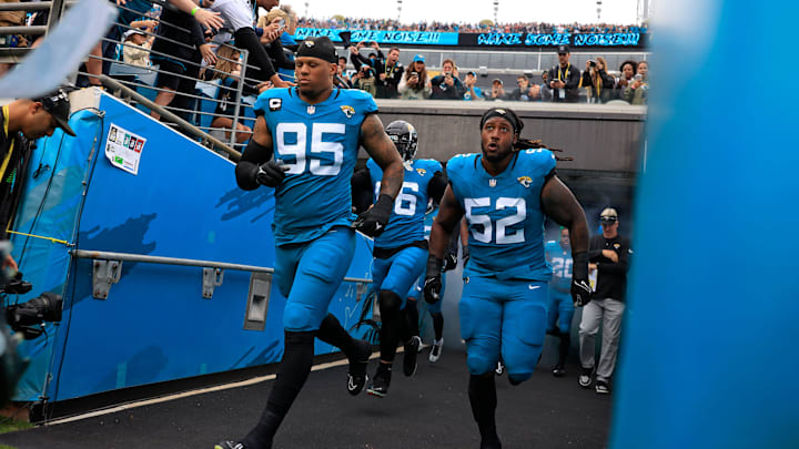 Jacksonville Jaguars defensive end Roy Robertson-Harris (95) defensive end Adam Gotsis (96),