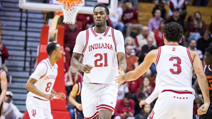 Indiana's Mackenzie Mgbako (21) and Anthony Leal (3) high five against Sam Houston at Simon Skjodt Assembly Hall.