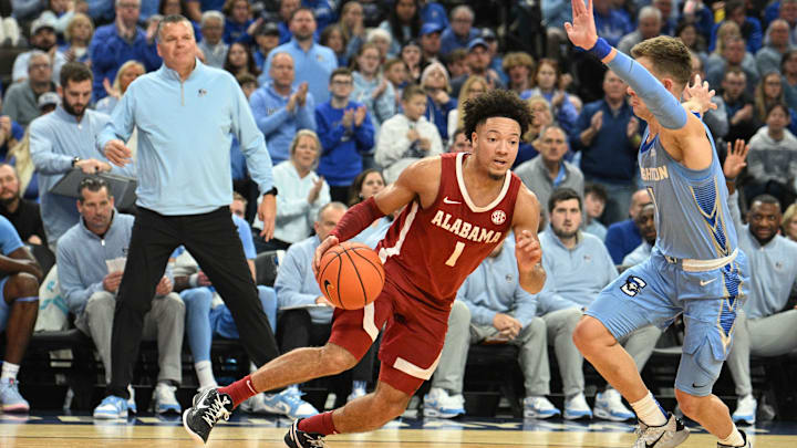 Dec 16, 2023; Omaha, Nebraska, USA; Alabama Crimson Tide guard Mark Sears (1) drives against Creighton Bluejays guard Steven Ashworth (1) in the first half at CHI Health Center Omaha. Mandatory Credit: Steven Branscombe-Imagn Images Dec 16, 2023; Omaha, Nebraska, USA; Alabama Crimson Tide guard Mark Sears (1) drives against Creighton Bluejays guard Steven Ashworth (1) in the first half at CHI Health Center Omaha. Mandatory Credit: Steven Branscombe-Imagn Images