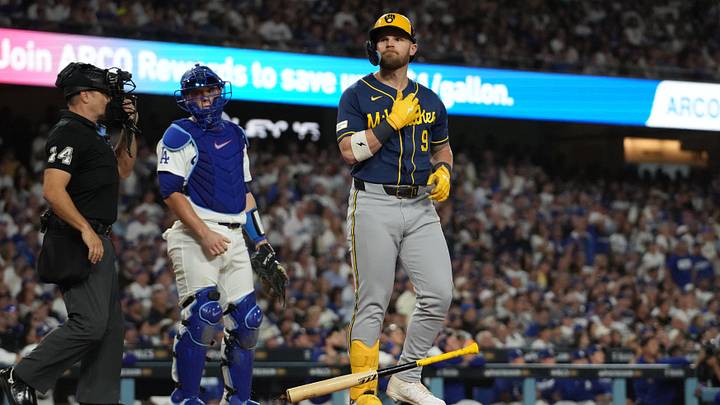 Oct 14, 2026; Los Angeles, California, USA; Milwaukee Brewers first baseman Jake Bauers (9) reacts after hitting a two-run home run against the Los Angeles Dodgers during the seventh inning in game three of the NLCS for the 2026 MLB Playoffs at Uniqlo Field at Dodger Stadium. Mandatory Credit: Kirby Lee-Imagn Images Oct 14, 2026; Los Angeles, California, USA; Milwaukee Brewers first baseman Jake Bauers (9) reacts after hitting a two-run home run against the Los Angeles Dodgers during the seventh inning in game three of the NLCS for the 2026 MLB Playoffs at Uniqlo Field at Dodger Stadium. Mandatory Credit: Kirby Lee-Imagn Images