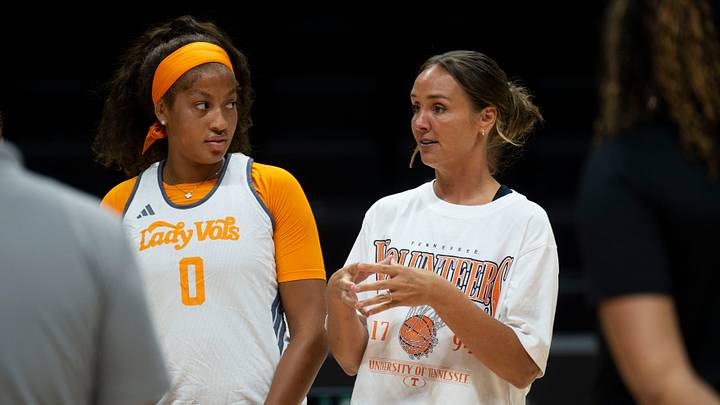 Tennessee Lady Vols basketball player Kaylene Smikle (0) stands beside Tennessee Lady Vols basketball coach Kim Caldwell as she gives instructions to the team during practice on August 3, 2026, in Knoxville, Tennessee.