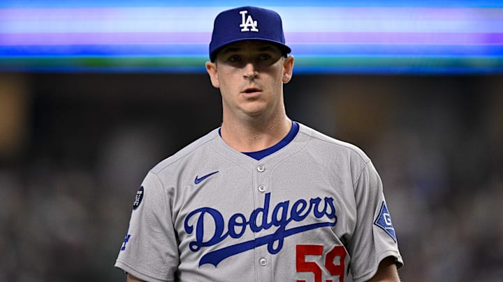 Apr 20, 2025; Arlington, Texas, USA; Los Angeles Dodgers relief pitcher Evan Phillips (59) comes off the field during the game between the Texas Rangers and the Los Angeles Dodgers at Globe Life Field. Mandatory Credit: Jerome Miron-Imagn Images