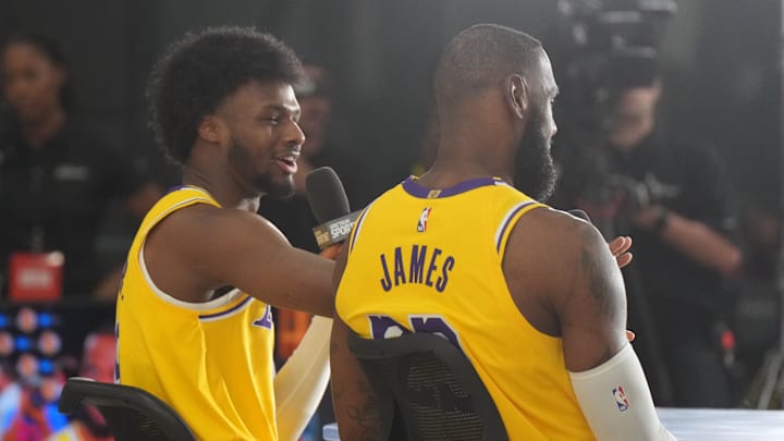 Sep 30, 2024; El Segundo, CA, USA; Los Angeles Lakers forward LeBron James (23) with son Bronny James (9) during media day at the UCLA Health Training Center. Mandatory Credit: Kirby Lee-Imagn Images