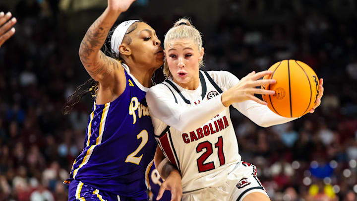 Nov 17, 2024; Columbia, South Carolina, USA; South Carolina Gamecocks forward Chloe Kitts (21) drives around East Carolina Lady Pirates forward Tatyana Wyche (2) in the first half at Colonial Life Arena. Mandatory Credit: Jeff Blake-Imagn Images