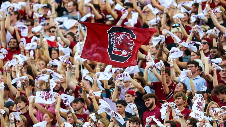 Aug 31, 2024; Columbia, South Carolina, USA; South Carolina Gamecocks wave a flag in the first half against the Old Dominion Monarchs at Williams-Brice Stadium. Mandatory Credit: Jeff Blake-Imagn Images