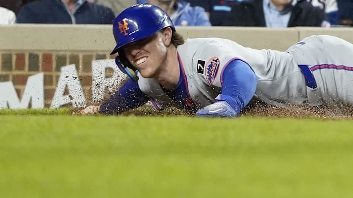 Sep 25, 2025; Chicago, Illinois, USA; New York Mets third base Brett Baty (7) scores against the Chicago Cubs during the sixth inning at Wrigley Field. Mandatory Credit: David Banks-Imagn Images