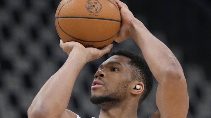 Apr 25, 2025; Milwaukee, Wisconsin, USA; Milwaukee Bucks forward Giannis Antetokounmpo (34) warms up with his brother Thansis Anteokounmpo (43) before game three of first round of the 2024 NBA Playoffs at Fiserv Forum. Mandatory Credit: Michael McLoone-Imagn Images