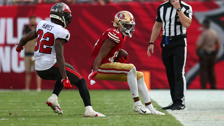 Nov 10, 2024; Tampa, Florida, USA; Tampa Bay Buccaneers safety Josh Hayes (32) forces San Francisco 49ers wide receiver Jauan Jennings (15) out of bounds in the fourth quarter at Raymond James Stadium. Mandatory Credit: Nathan Ray Seebeck-Imagn Images Nov 10, 2024; Tampa, Florida, USA; Tampa Bay Buccaneers safety Josh Hayes (32) forces San Francisco 49ers wide receiver Jauan Jennings (15) out of bounds in the fourth quarter at Raymond James Stadium. Mandatory Credit: Nathan Ray Seebeck-Imagn Images